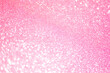 Sparkling bokeh background in a fresh pink color. pink sequins background defocus