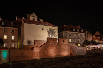 Wall Mural - Warsaw city center is illuminated at night by artificial lighting