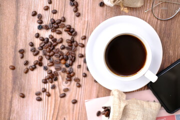 Poster - coffee beans on table background, space for text