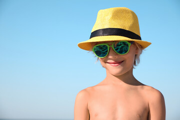 Sticker - Cute little child wearing beach hat on sunny day, space for text