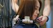 Woman perm her hair in salon
