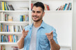 © Daniel Ernst - Young hispanic hipster man with beard and casual clothes