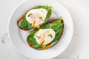 Wall Mural - Sandwiches with spinach and poached egg