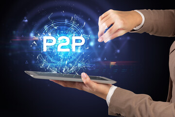 Close-up of a touchscreen with P2P abbreviation, modern technology concept