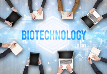 Group of Busy People Working in an Office with BIOTECHNOLOGY inscription, modern technology concept