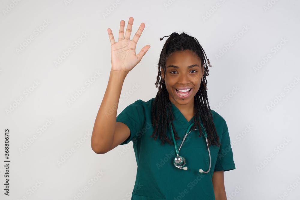 Portrait of cheerful, outgoing friendly-looking young woman wearing ...