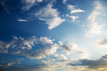 Large heavy clouds slowly float across the blue beautiful sky. Stunning landscape and view. Beautiful sky. .