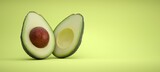 Fototapeta  - Avocado cut in half on green background.
