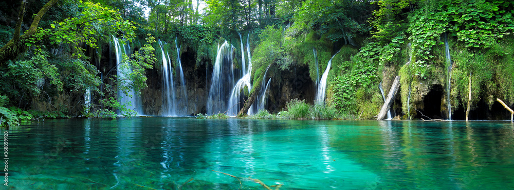 Waterfalls with clear water in Plitvice National Park, Croatia - obrazy, fototapety, plakaty 