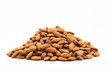 Pile of roasted almonds on white background
