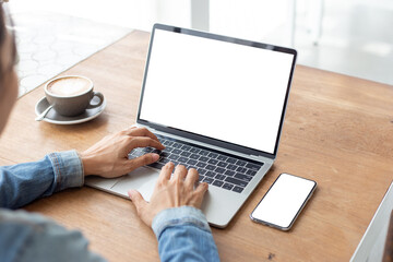 computer,cell phone mockup image.hand woman work using laptop texting mobile.blank screen with white background for advertising,contact business search information on desk in cafe.marketing,design