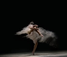 Graceful Lady In Body Dance In Cloud Of Dust