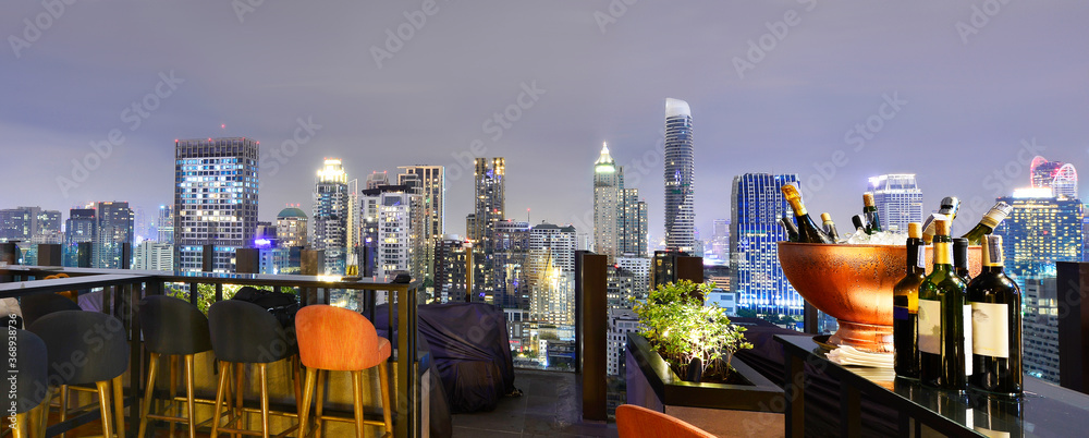 Bangkok city view point from rooftop bar, overlooking a magnificent cityscape blue sky and city light, Thailand - obrazy, fototapety, plakaty 
