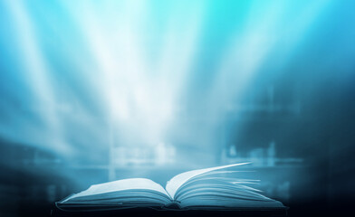 Poster - The blurred book that is bewitched with magic, the magic light in the dark, with the bright light shining down as the power to search for knowledge. For research and use as a blurred background