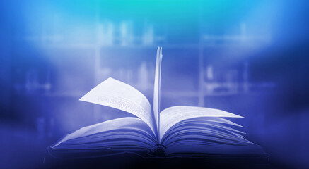 Poster - The blurred book that is bewitched with magic, the magic light in the dark, with the bright light shining down as the power to search for knowledge. For research and use as a blurred background