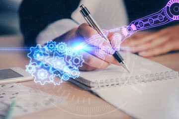 Double exposure of writing hand on background with data technology hologram. Big data concept.