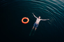 High Angle View Of Man Swimming In Sea