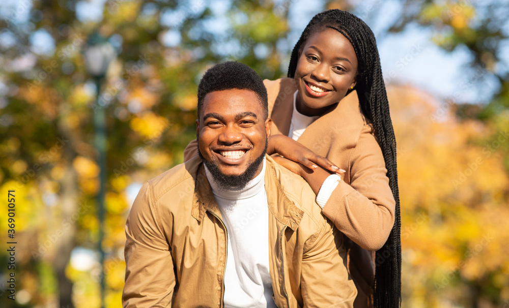 Portrait of happy african american couple posing outdoors Stock Photo ...