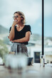 © Jacob Lund - Smiling businesswoman in a conference room