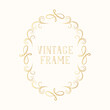 © Kirill - Hand drawn golden ornate oval swirl border in vignette style. Vector isolated vintage certificate frame.  Calligraphic gold scrolls for invitation card.