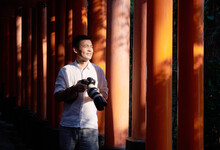 Asian Photographer In The Road Route, In The Temple Of Japan