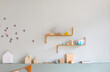 © Lumina/Stocksy - Shelves with Toys at Child's Room
