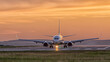 © damianbn - airplane landing at sunset Varna Airport