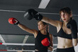 © Sibstock/Stocksy - two young girls are training boxing