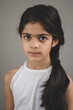 © Pranav - School age girl of British Indian descent displays different facial expressions.