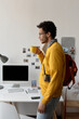 © Clique Images/Stocksy - Stylish Male Student With Morning Coffee