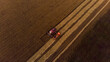 © Danil Nevsky/Stocksy - Agricultural machines harvesting crop in field