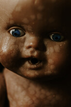 Close Up Of A Vintage Baby Doll, In The Shadow