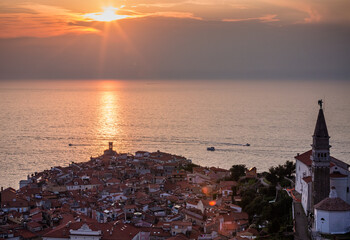 Wall Mural - aerial view of a sunset over the sea in Piran, Slovenia