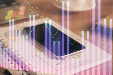 Double exposure of forex chart drawing and cell phone background. Concept of financial data analysis