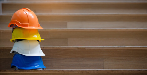 Wall Mural - Multicolored Safety Construction Worker Hats. Teamwork of the construction team must have quality. Whether it is engineering, construction worker. Have a helmet to wear at work. For safety at work.
