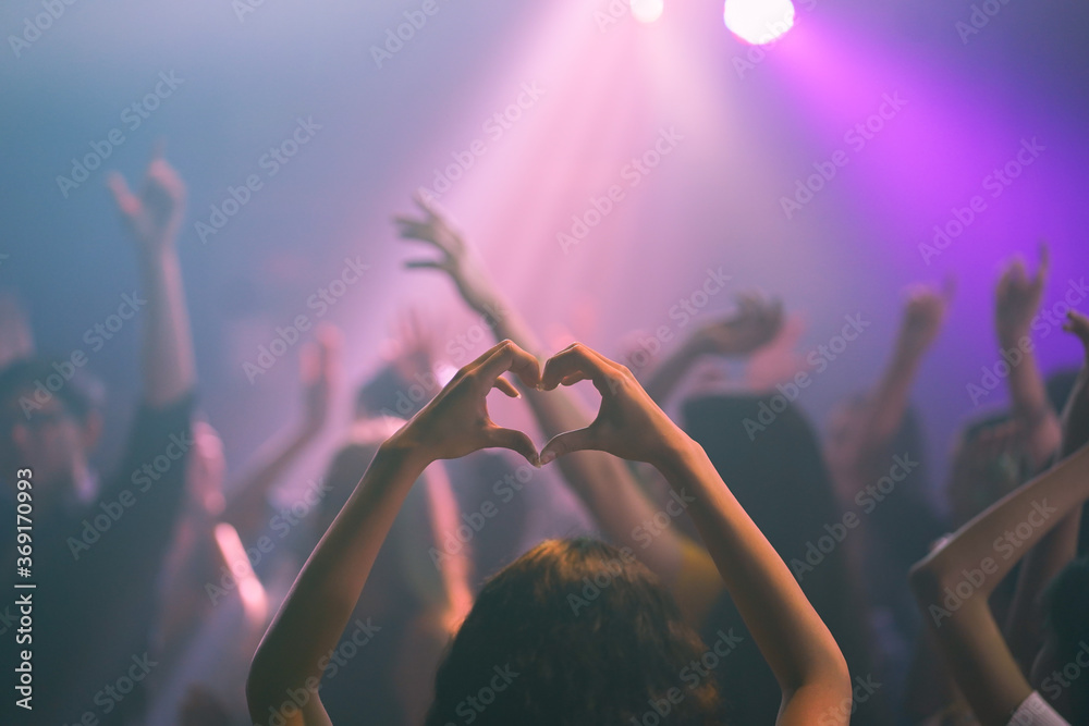 Party with friends dancing in the club. asian event holidays celebrate nightlife. Group of young girl happy dancing party hand holding a drink.  Lady with shape heart in event concert - obrazy, fototapety, plakaty 