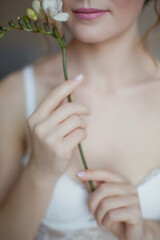 Woman in lingerie with flower