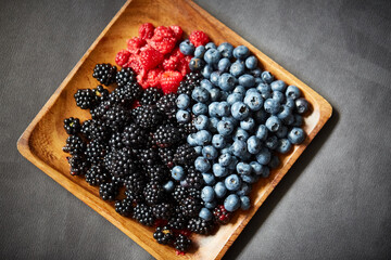 raspberry and blackberry on plate