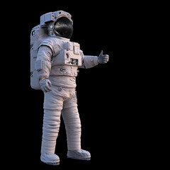 Wall Mural - astronaut showing thumbs up, standing spaceman isolated on black background