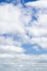 Wall Mural - Beautiful vertical photo of light blue sky and lot white clouds, qualitative high detailed shoot, no birds and noise.