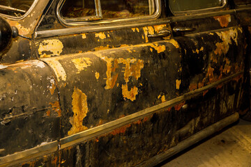 Poster - old rusty retro car of black color.