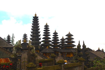 Pagoda of Besakih temple, balinese hindu temple, on the water, bali, indonesia.