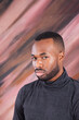 © Allen Penton - Handsome Black man looking Pensive in a grey shirt
