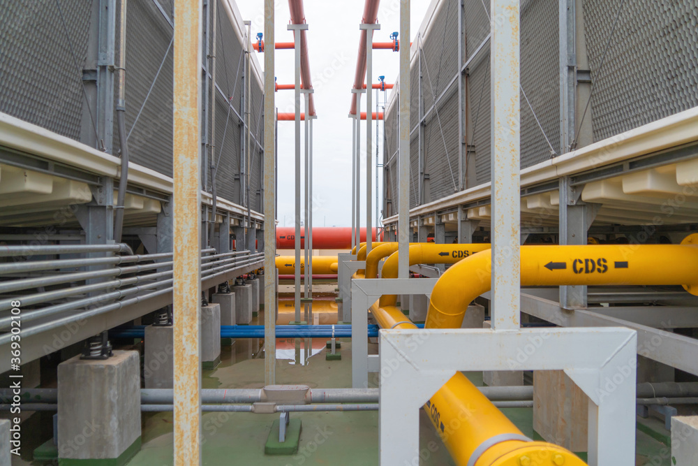 Cd R Pipe Chiller tower or cooling tower on rooftop of a office building. System ...