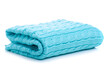 Folded knitted mint green blanket on white background isolation, top view