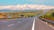 © muratart - Curve asphalt highway road with cars in the form of mirage against Taurus mountain