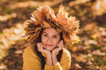 Wall Mural - Close up portrait of adorable pretty girl wear maple leaves wreath head touch hands face chin enjoy forest autumn rest relax