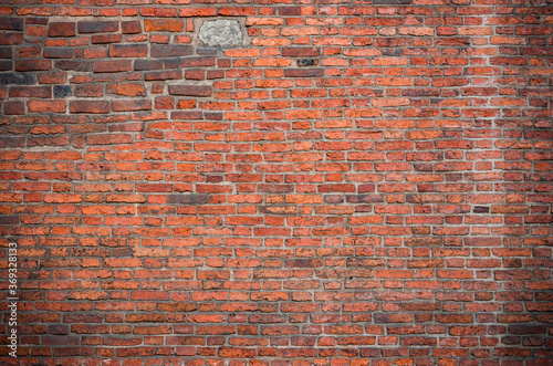 Weathered red brick wall background, texture Canvas Print