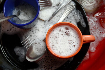 Dish washing. soaking in the kitchen sink. After the Dinner it's time to do the Dishes 