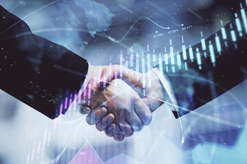 Double exposure of forex graph hologram and handshake of two men. Stock market concept.